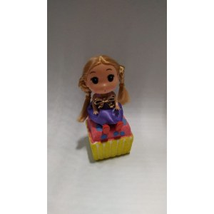 Куколка с русыми косами в сарафане с бантиком на груди